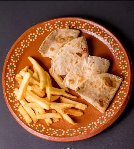 Quesadilla plate served with french fries